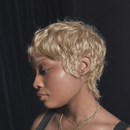 Trendy Tousled Blonde Mullet With Stylish Wispy Bangs
