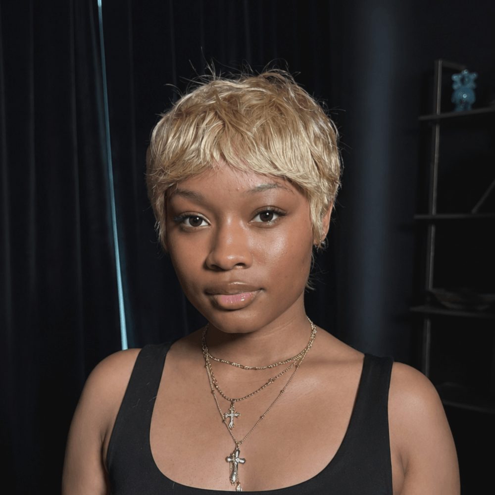 Trendy Tousled Blonde Mullet With Stylish Wispy Bangs