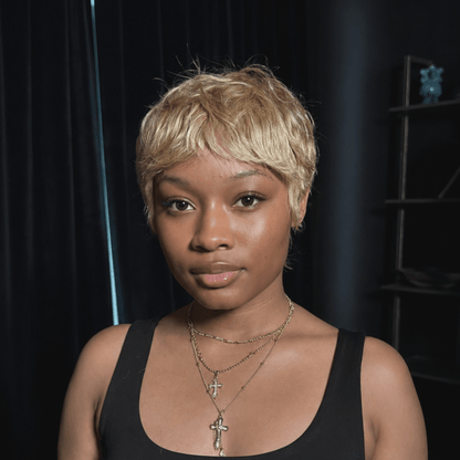 Trendy Tousled Blonde Mullet With Stylish Wispy Bangs